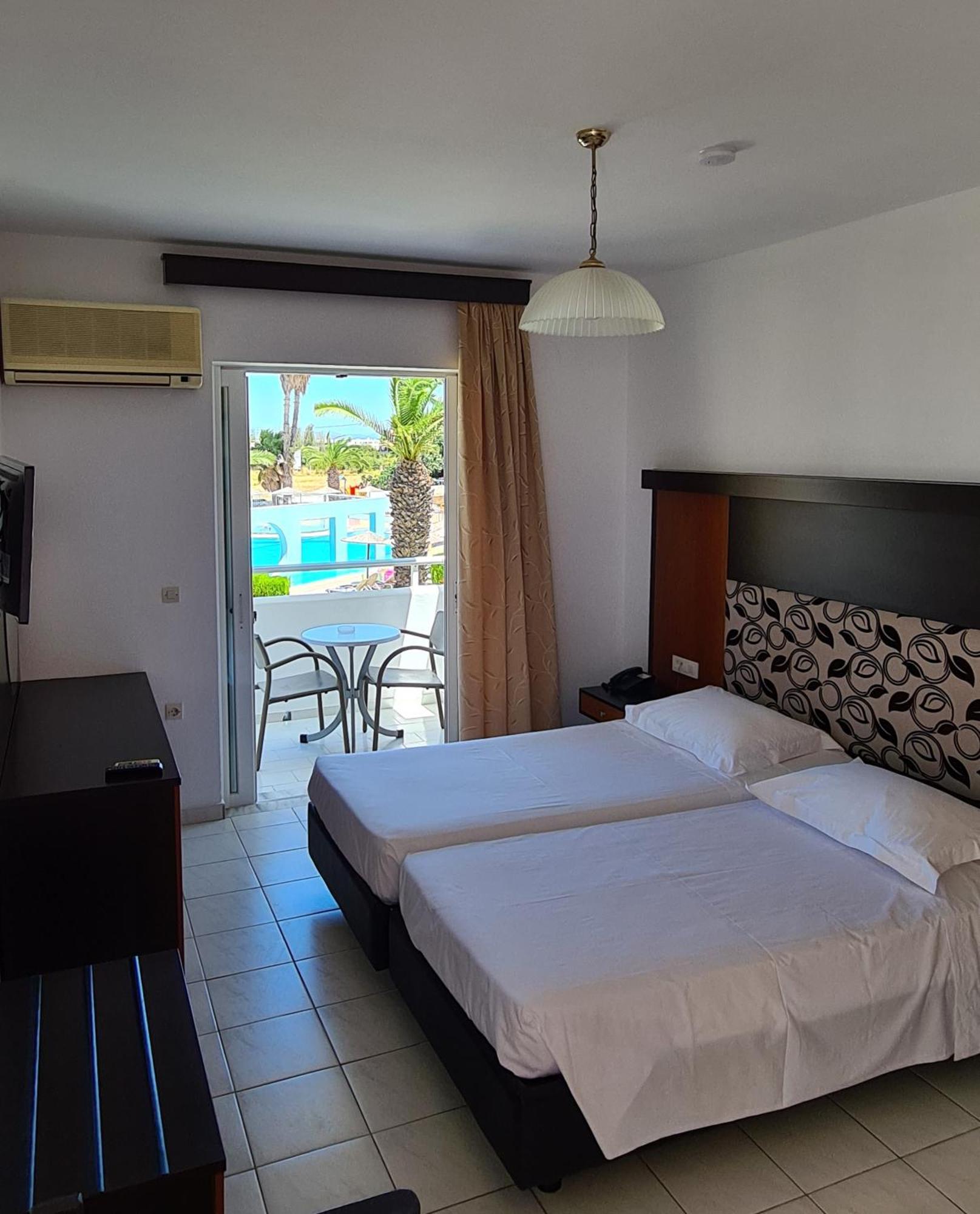 Corali Hotel Тигаки Экстерьер фото